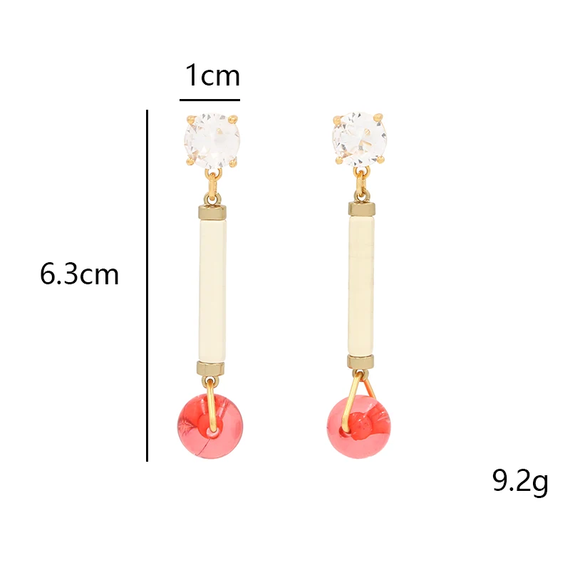 Long transparency acrylic pendant with diamond earrings